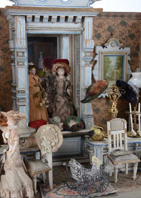 Lot 1080 - A rare late 19th century Gottschalk wooden dolls’ house room millinery shop