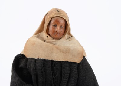 Lot 1340 - An early poured bees wax nun doll
