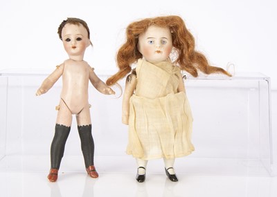 Lot 995 - Two all-bisque dolls’ house dolls