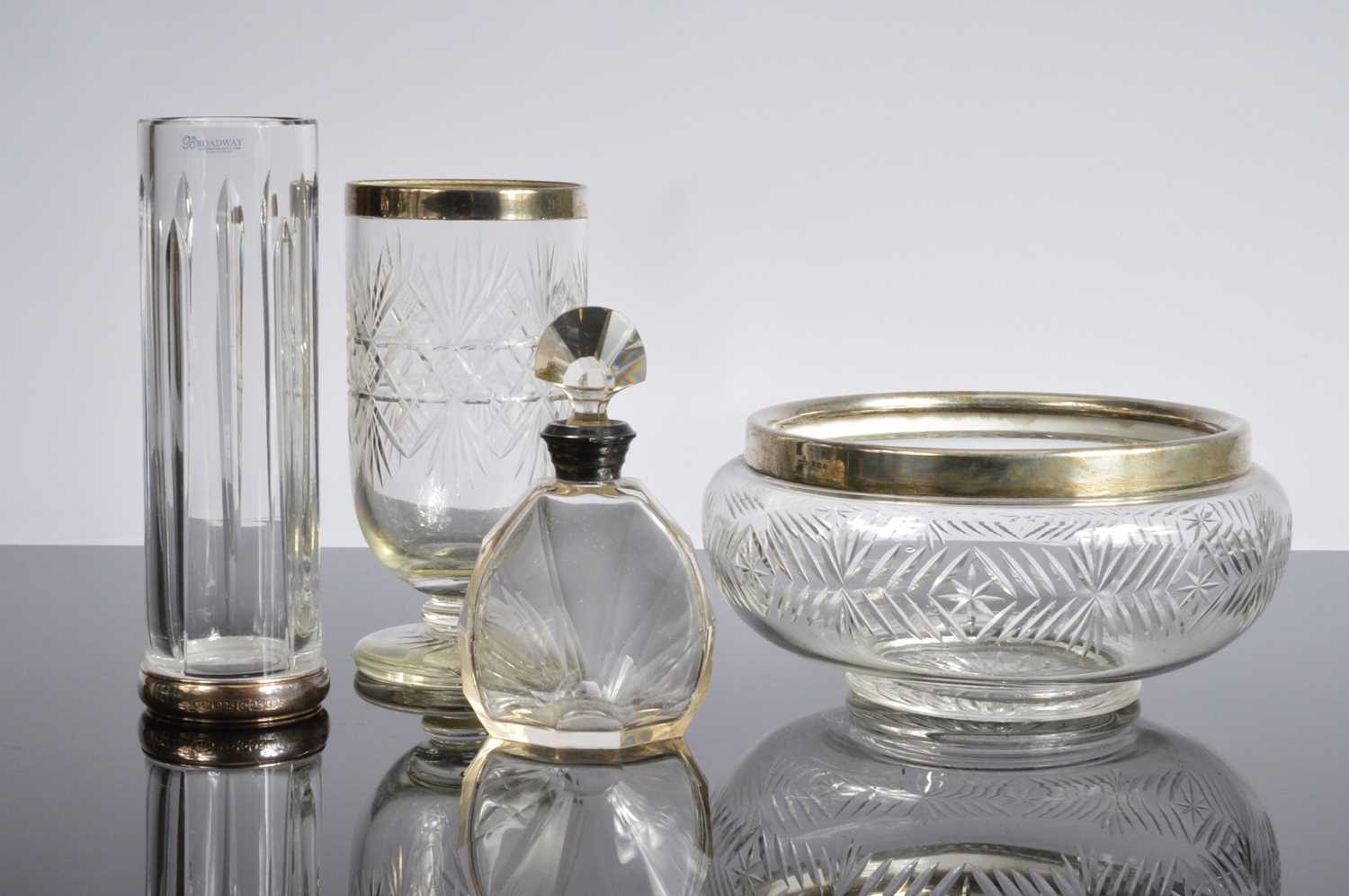 Lot 16 - Four glass and silver mounted items