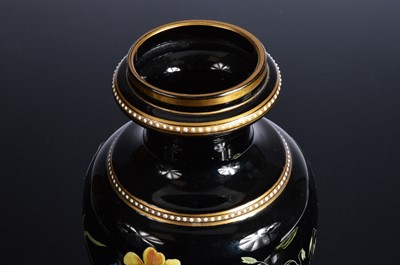 Lot 17 - An early 20th century Moser style black glass vase