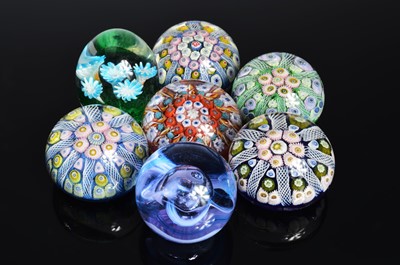 Lot 23 - A collection of glass paperweights