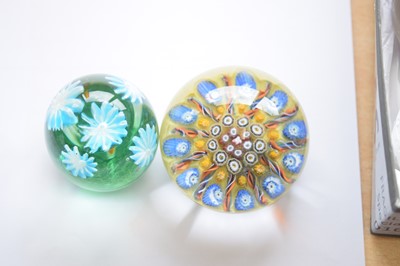 Lot 23 - A collection of glass paperweights