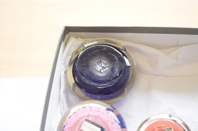 Lot 23 - A collection of glass paperweights