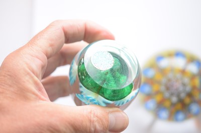 Lot 23 - A collection of glass paperweights