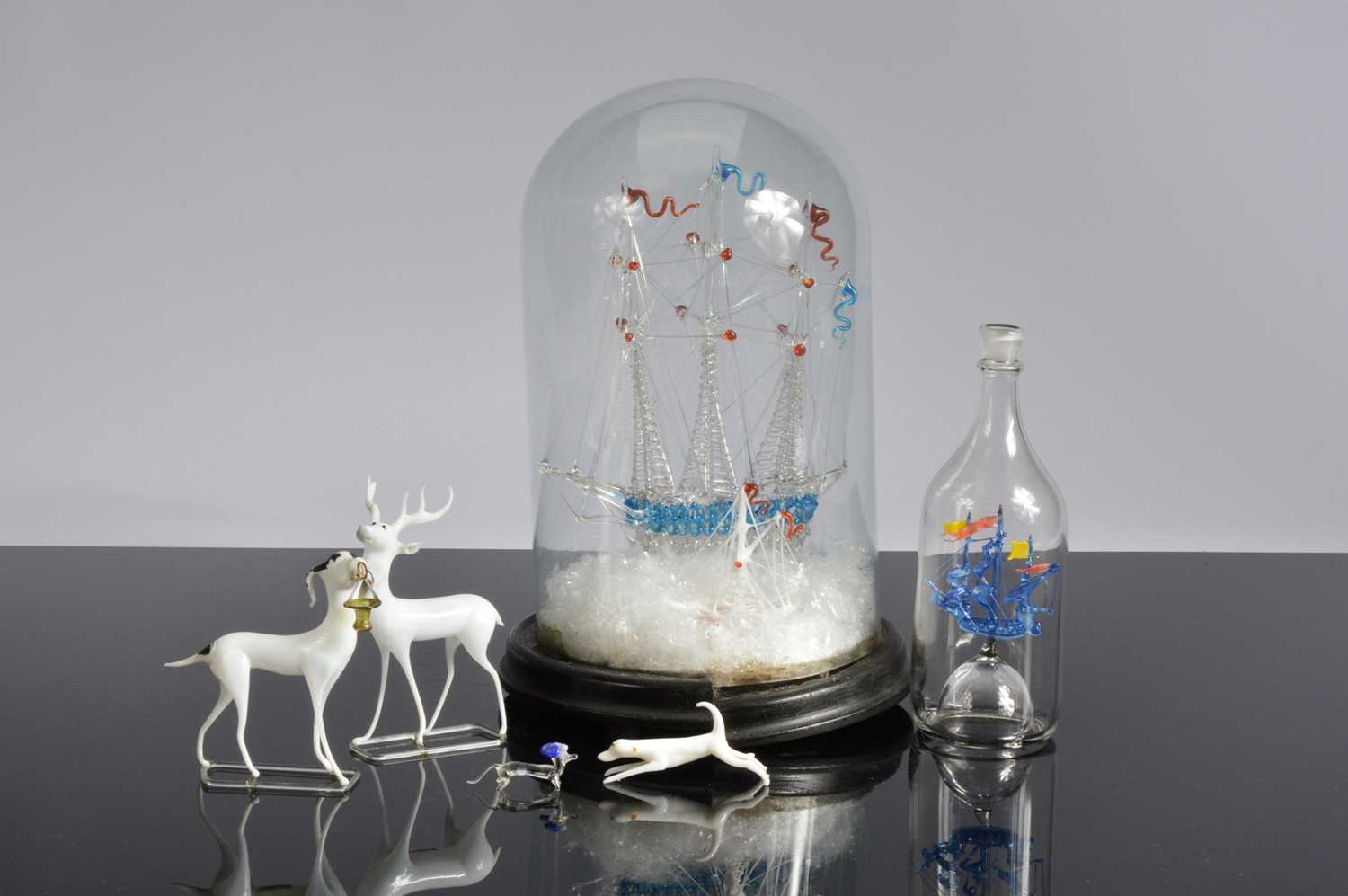 Lot 24 - Five glass sculptures
