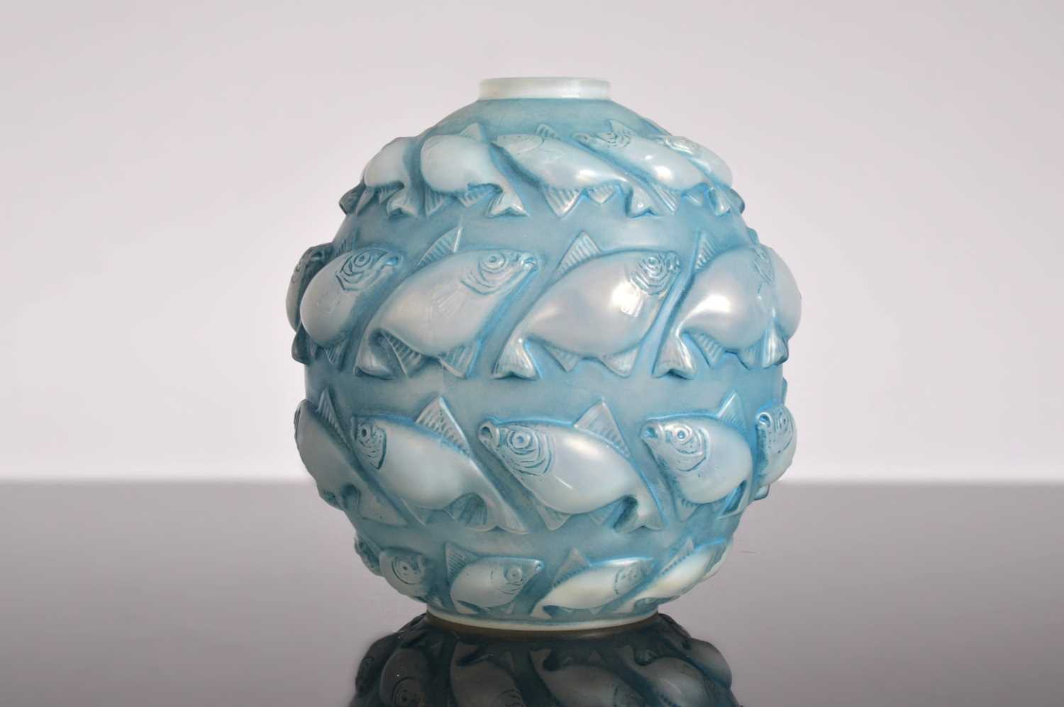 Lot 25 - A 1920s Lalique glass Camaret opalescent blue vase by Rene Lalique