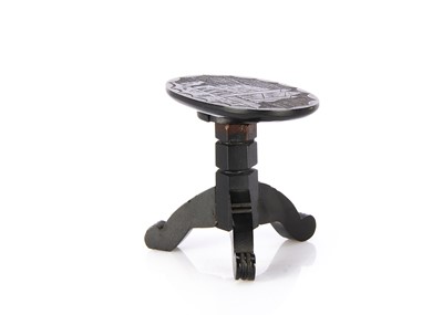 Lot 1007 - A 19th century Whitby jet dolls’ house occasional table