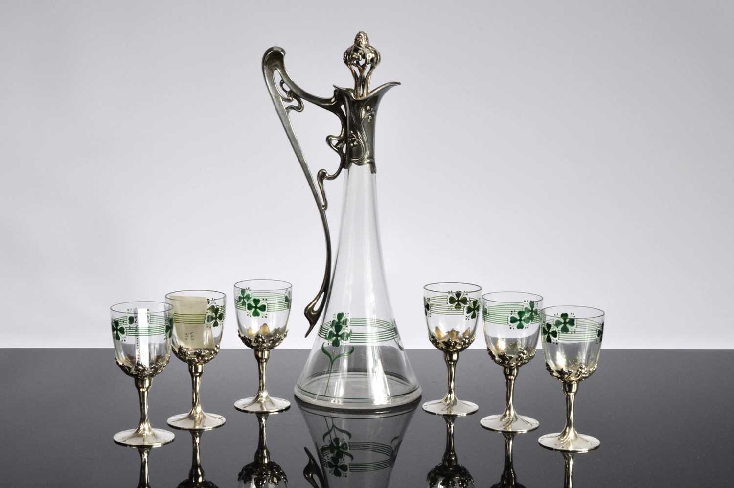 Lot 27 - A fine Art Nouveau WMF glass and pewter claret jug and six wine glasses
