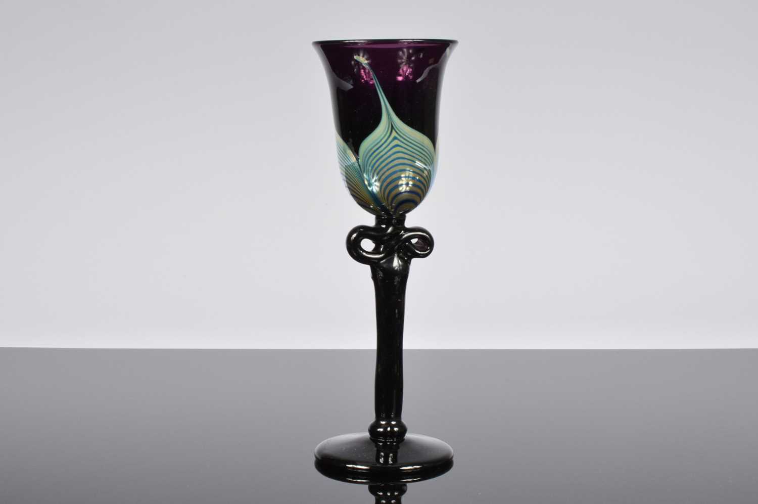 Lot 44 - A 1970s American glass goblet by Roland C. Correia