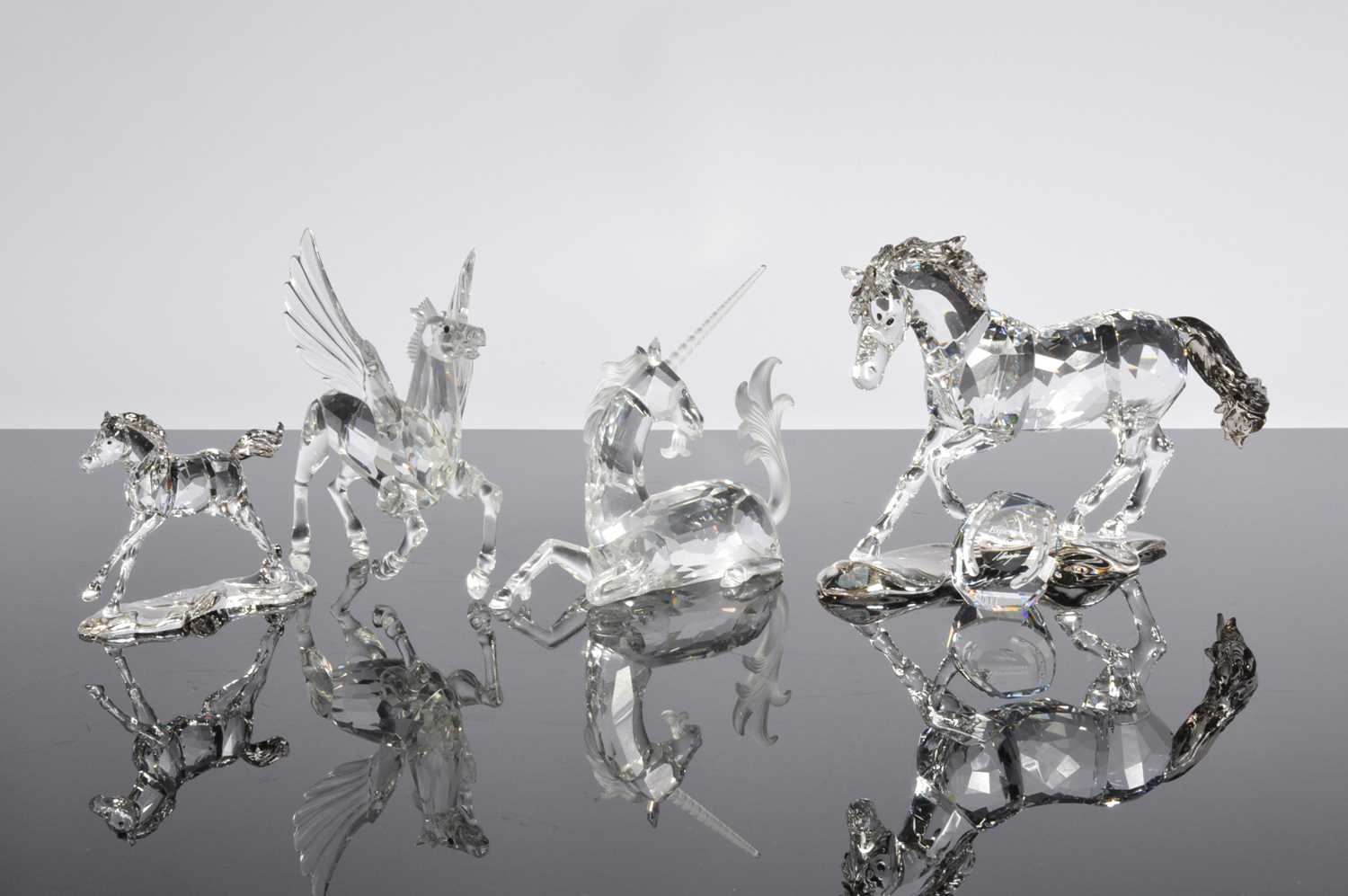 Lot 72 - Four Swarovski Horse figures