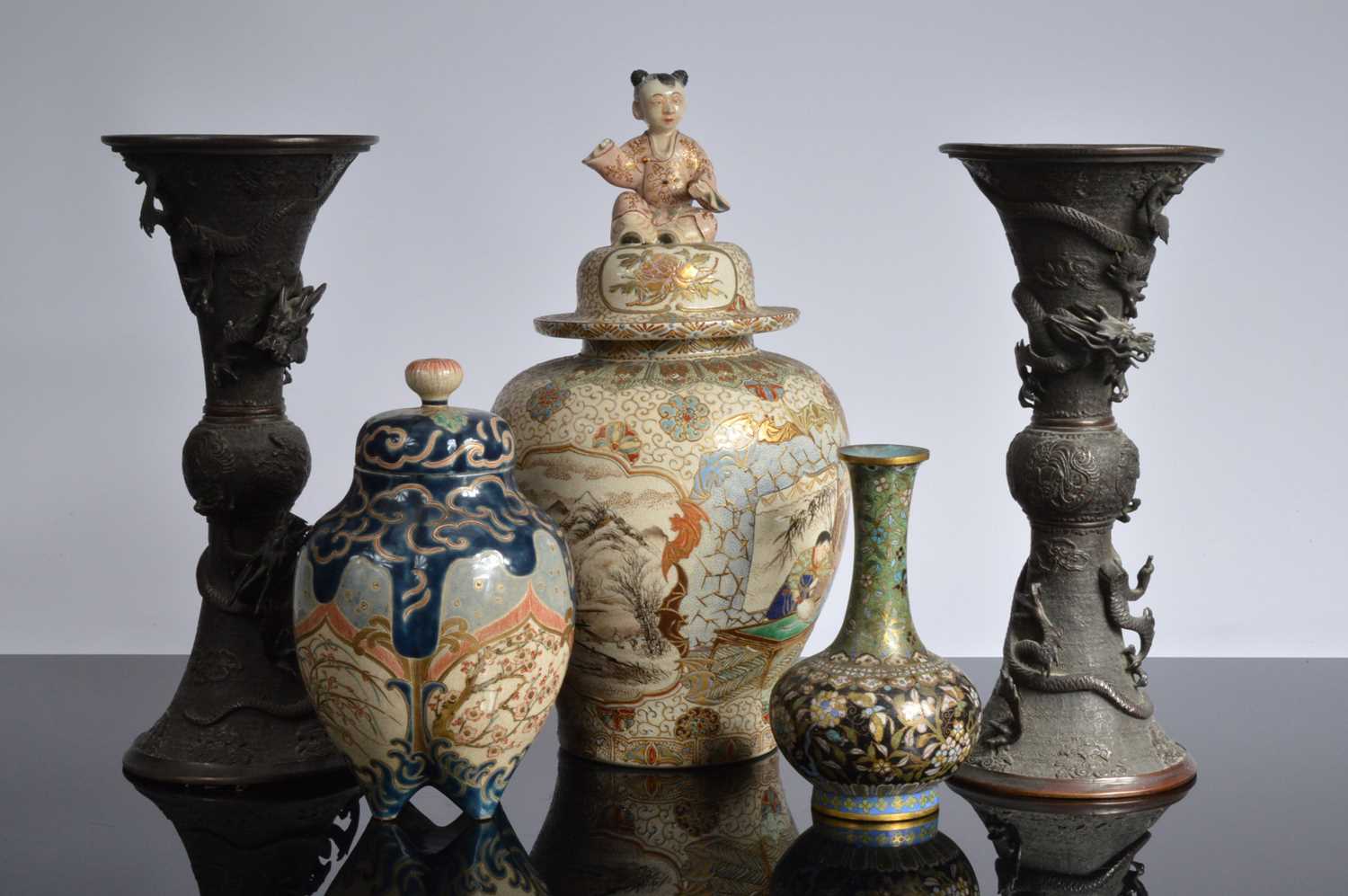 Lot 82 - Two Japanese earthenware covered jars and three other items