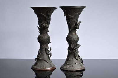 Lot 82 - Two Japanese earthenware covered jars and three other items