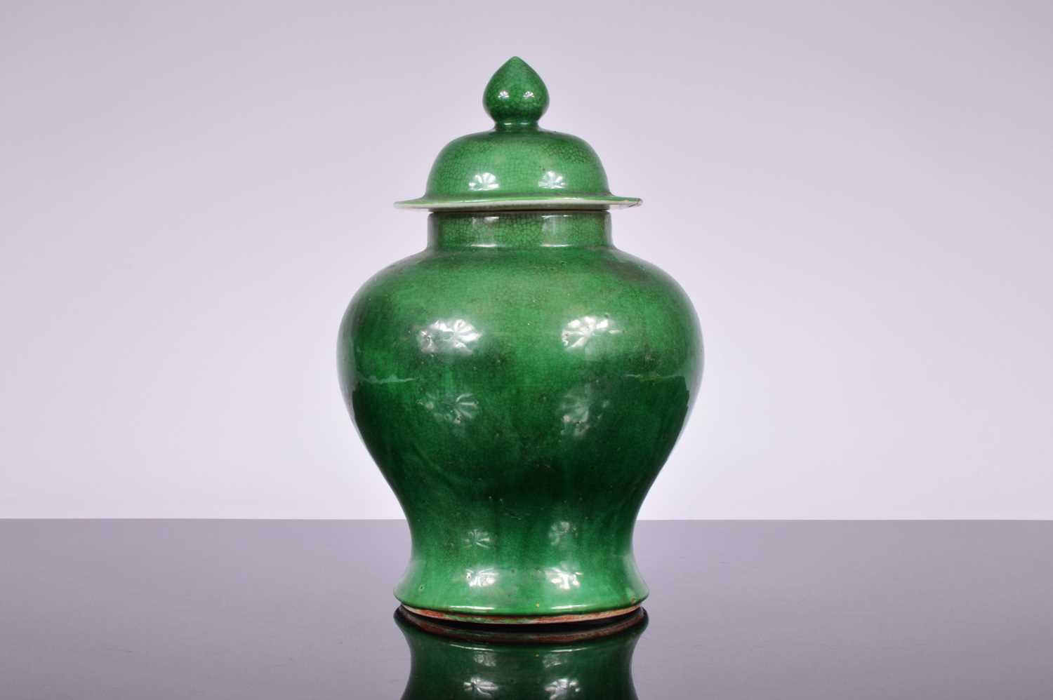 Lot 90 - A vintage Chinese porcelain green crackle glazed jar and cover