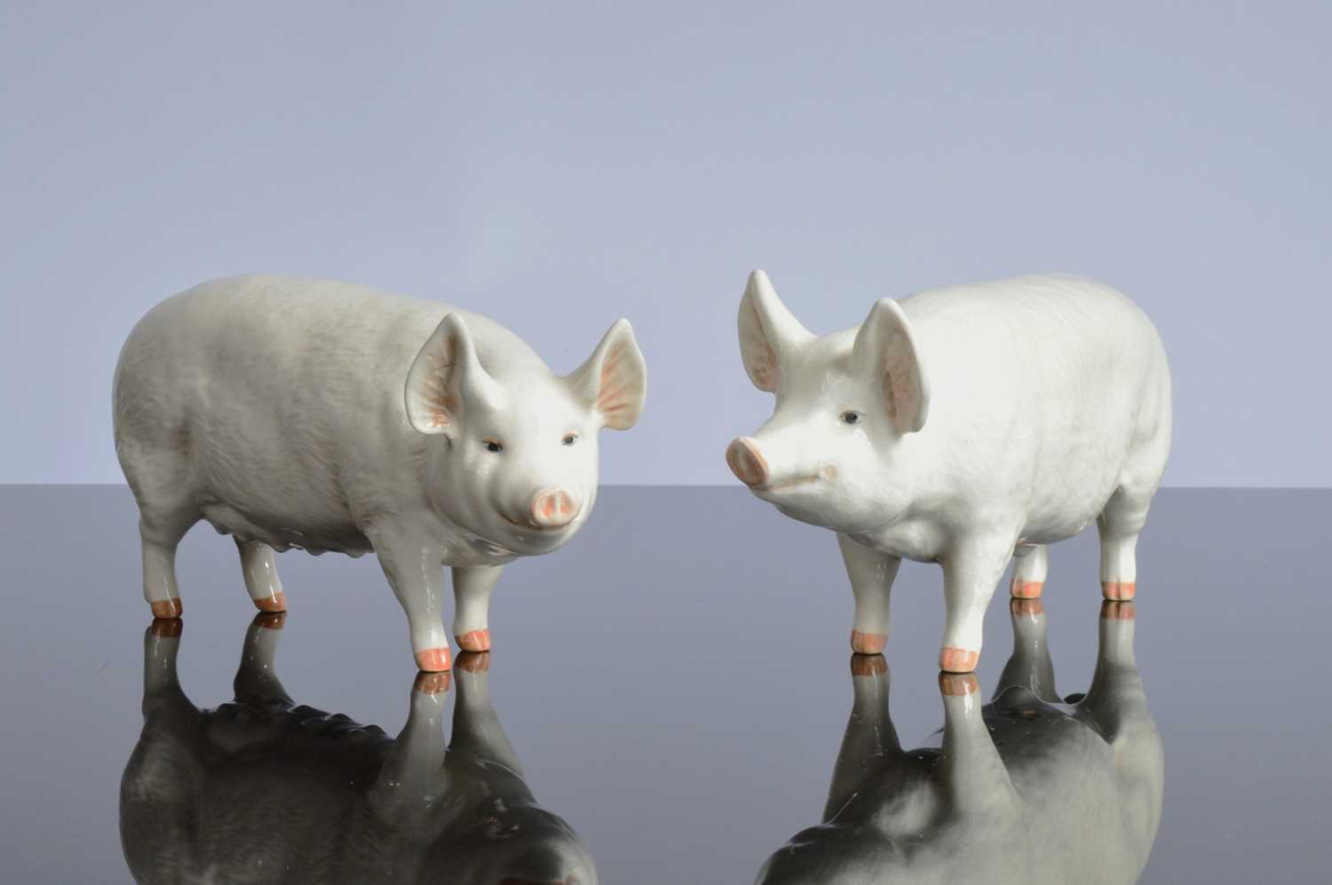 Lot 115 - A pair of Beswick pottery pigs