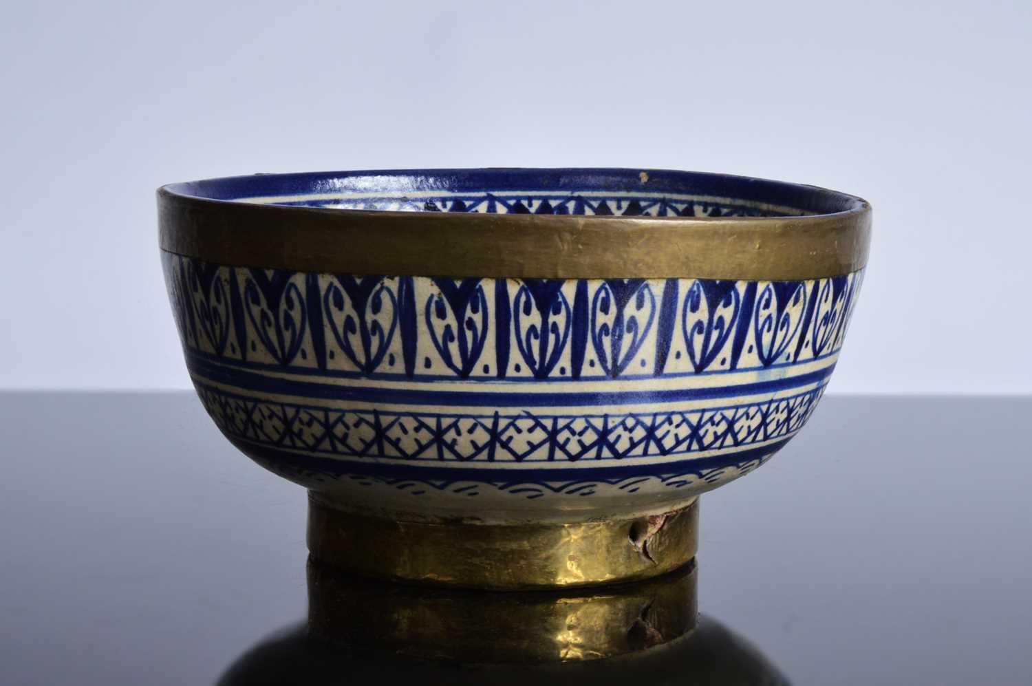 Lot 130 - A North African blue and white pottery bowl