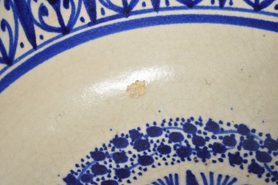 Lot 130 - A North African blue and white pottery bowl