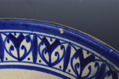 Lot 130 - A North African blue and white pottery bowl