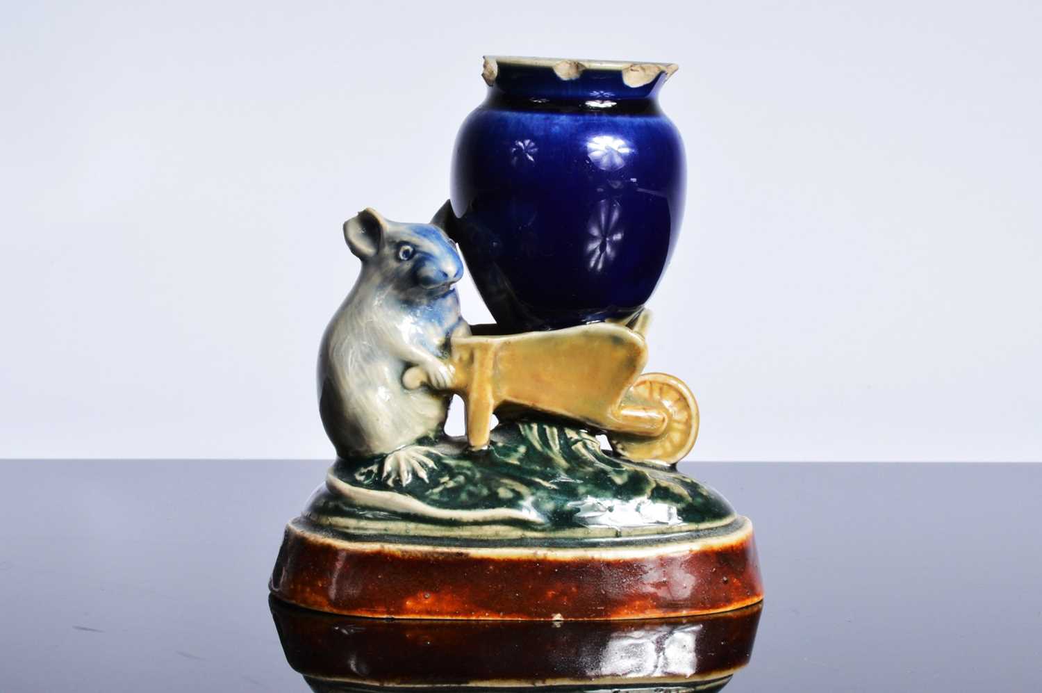 Lot 163 - A damaged Royal Doulton stoneware comical mouse with wheel barrow sculpture after George Tinworth
