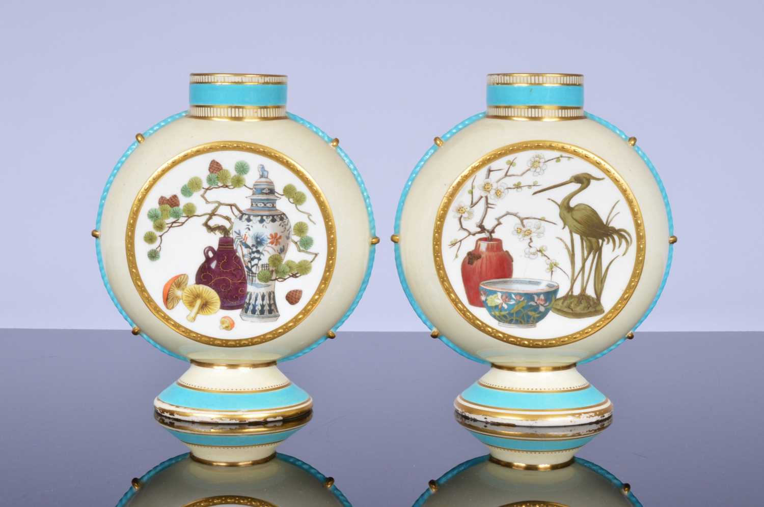 Lot 205 - A pair of Victorian period Minton porcelain moon flask vases