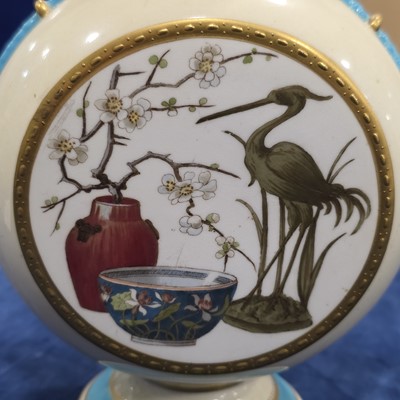 Lot 205 - A pair of Victorian period Minton porcelain moon flask vases