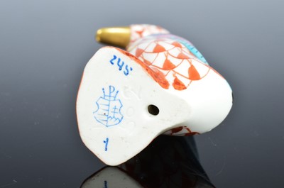 Lot 210 - Two small Herrend porcelain animals and a Royal Copenhagen porcelain polar bear group