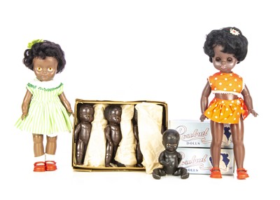 Lot 1044 - Vinyl and plastic black dolls