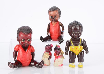 Lot 1045 - Japanese celluloid black dolls and figures