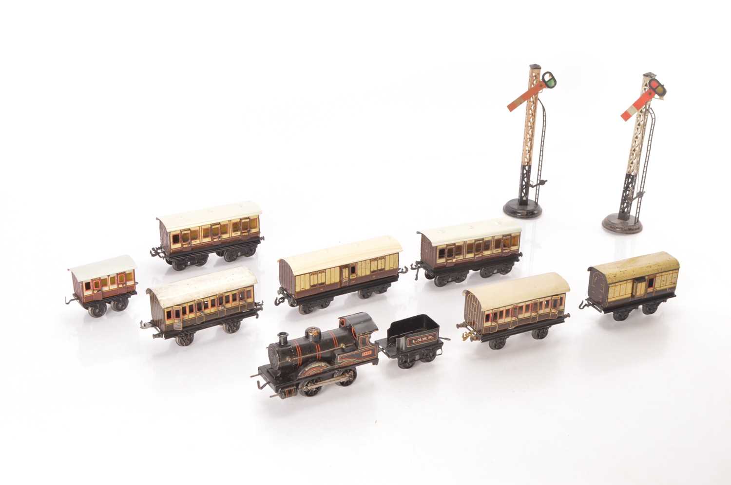 Lot 96 - Bing 0 Gauge Locomotive and Passenger rolling stock (10)