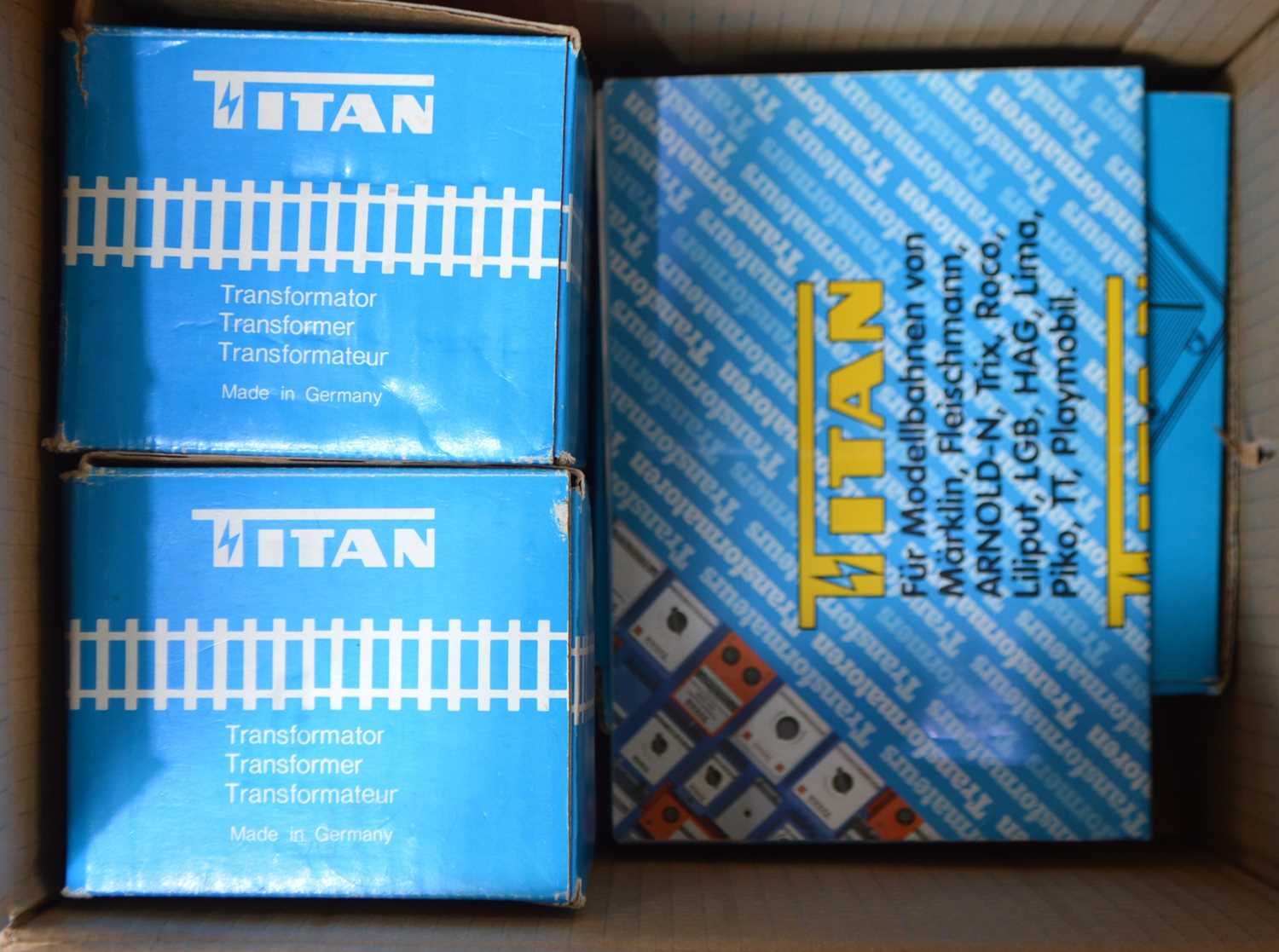 Lot 169 - Lionel/Marklin 0 Gauge modern issue 3-rail tinplate track and transformers (95)