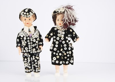 Lot 1071 - A pair of hard plastic dolls dressed as a Pearly King and Queen