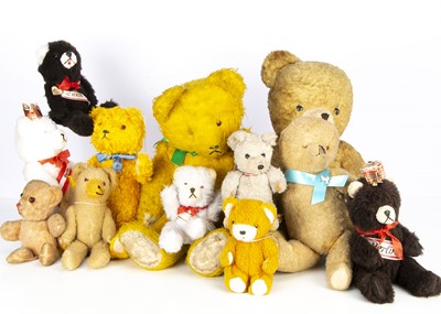 Lot 387 - Twelve synthetic plush post-war Teddy Bears