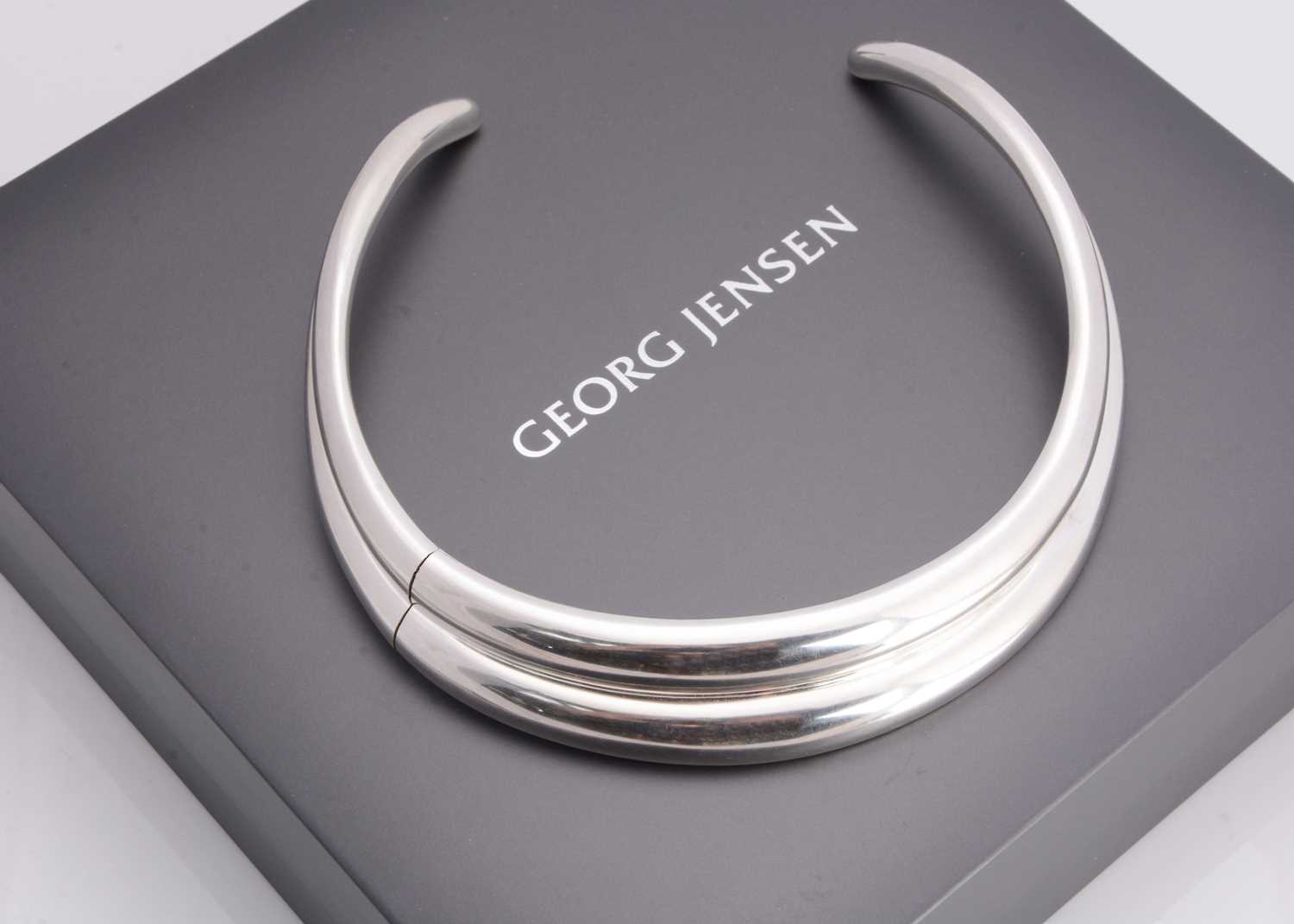 Lot 10 - A contemporary Georg Jensen silver curve torque necklace