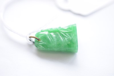 Lot 11 - A Chinese jadeite jade carved pendant