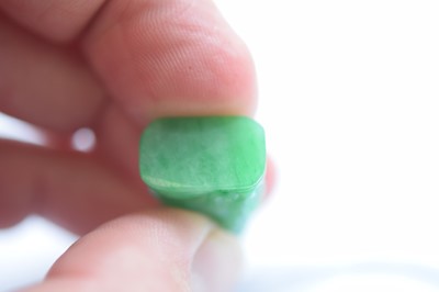 Lot 11 - A Chinese jadeite jade carved pendant