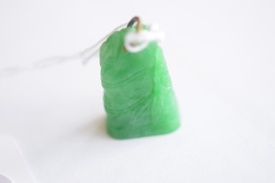Lot 11 - A Chinese jadeite jade carved pendant