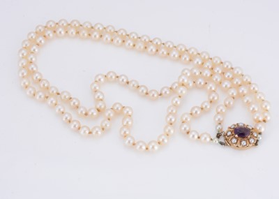 Lot 16 - A 9ct gold double row cultured pearl knotted twin set necklace