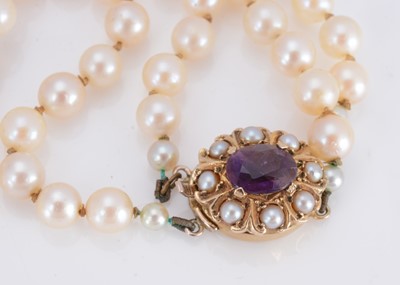 Lot 16 - A 9ct gold double row cultured pearl knotted twin set necklace