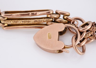 Lot 26 - A three bar gate link bracelet with padlock clasp