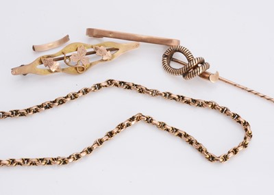 Lot 27 - A gold knot stick pin