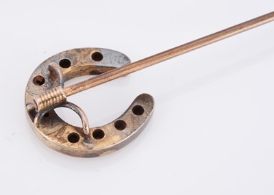 Lot 28 - A 19th Century ruby and diamond horseshoe stick pin