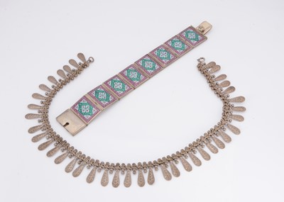 Lot 39 - A white metal Middle Eastern enamel decorated bracelet