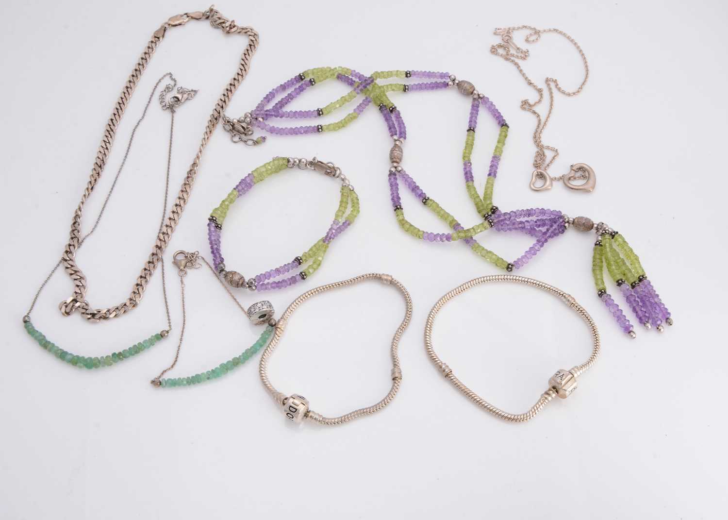 Lot 44 - A collection of green quartz and amethyst set jewels