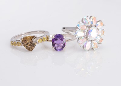 Lot 48 - A certificated mercury mystic topaz cluster dress ring