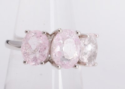Lot 49 - A certificated silver purple crackled quartz three stone dress ring