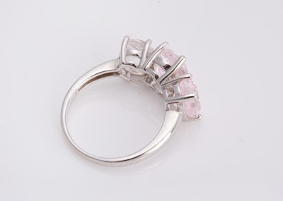 Lot 49 - A certificated silver purple crackled quartz three stone dress ring