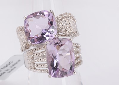 Lot 50 - Two certificated rose de France amethyst dress rings