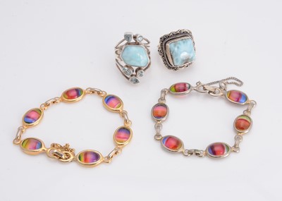 Lot 55 - Two large gem set hardstone dress rings