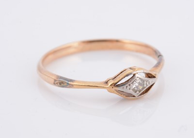 Lot 57 - An art deco 18ct gold and platinum set diamond dress ring