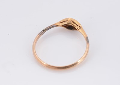 Lot 57 - An art deco 18ct gold and platinum set diamond dress ring